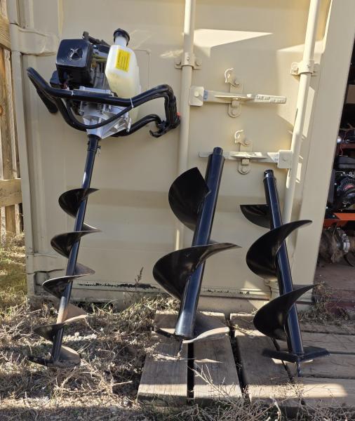 Gas-powered earth auger. Drills 30" deep, 8" to 12" wide holes.  Fence posts, tree planting, etc.